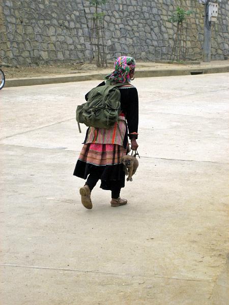 2006-10-29-01-52-33_180 Woman carrying small dog, Bac Ha.JPG